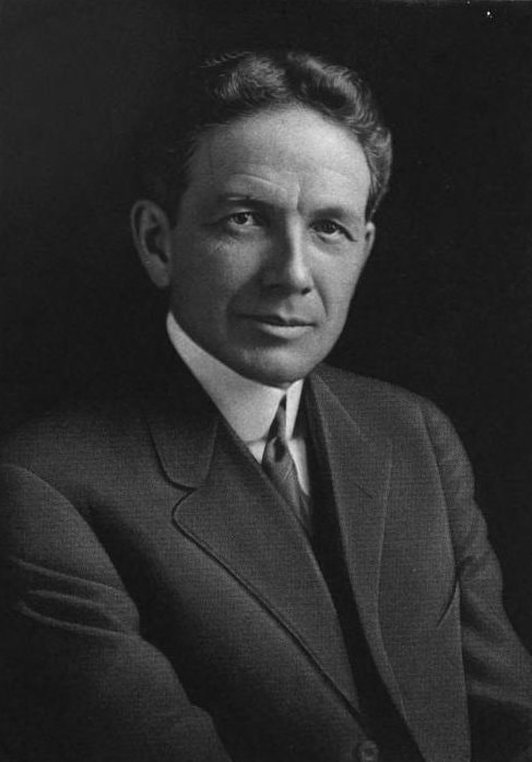 black and white picture of a dark-haired man
